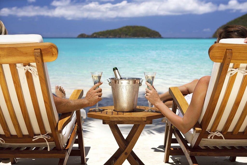 Couple Drinking Champagne Island Beach
