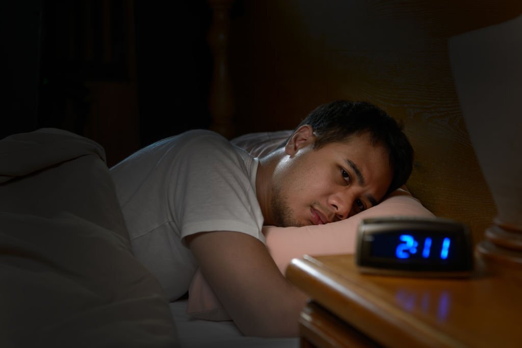 Depressed man suffering from insomnia 